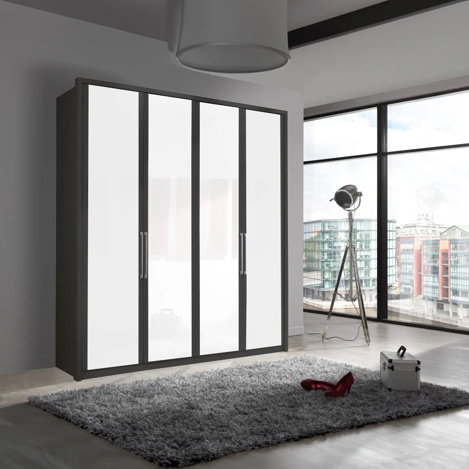 Image of Wiemann Bristol 4 Door Wardrobe with Graphite Carcase and White Glass Front. Also available with middle doors featuring mirror pads. Dimensions: Width 200cm, Height 216cm, Depth 58cm. Free Delivery and Assembly. 12 months interest-free pay monthly available - Lifestyle Image