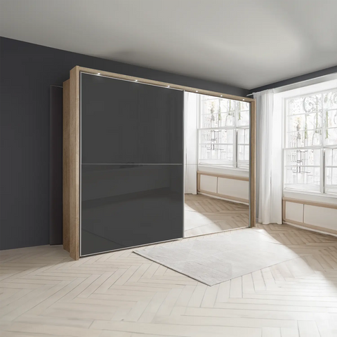 Wiemann Bristol Rustic Oak and Graphite Sliding Door Wardrobe With Mirror, We will Deliver and assemble the wardrobe. Available in 4 Width Sizes 150cm, 200cm, 250cm and 300cm height is 217cm - Lifestyle Image