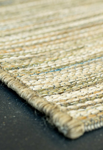 Brighton Neutral and Green Striped Indoor Outdoor Rug. Also available in various sizes and colours - Corner Of Rug Image