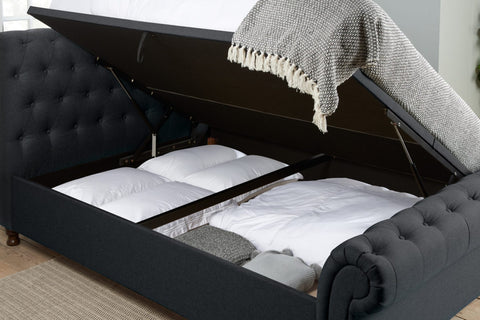 Venice Ottoman Bed: A chic statement piece with buttoned detailing, rolled headboard, and Ottoman storage. Elevate your bedroom with unbeatable comfort and style during this limited-time sale. Available in Double, Small Double, and King sizes. 007