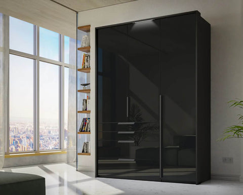 Rauch Frans Premium 3-Door Wardrobe with Drawers, Dimensions: W151cm x H223cm. Available in Glass Front White Glass, Basalt Glass, and Silk Grey Glass. Choose the optional mirror above drawers. Free delivery and assembly included. Enhance your space with this high-quality wardrobe - 006