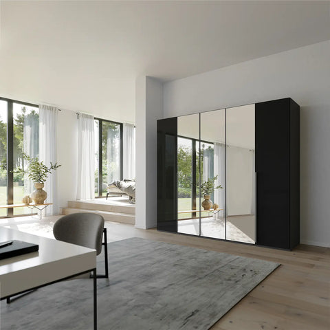 Rauch Purisma 5 Door Hinged Wardrobe in Basalt (Black) Glass and Mirror, Width 251cm, Height 223cm, Depth 60cm, with Long Black Door Handles. - Lifestyle View