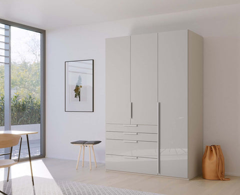 Rauch Frans Premium 3-Door Wardrobe with Drawers, Dimensions: W151cm x H223cm. Available in Glass Front White Glass, Basalt Glass, and Silk Grey Glass. Choose the optional mirror above drawers. Free delivery and assembly included. Enhance your space with this high-quality wardrobe - 008