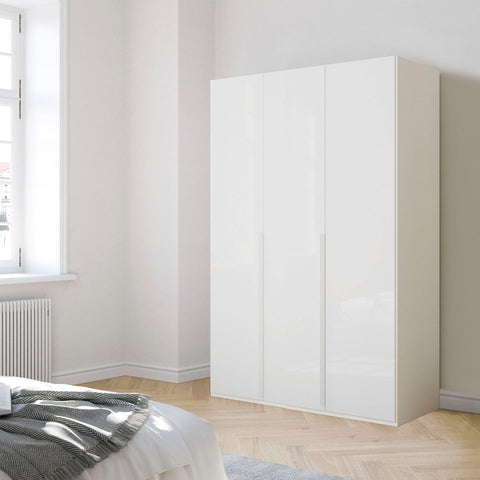 "Contemporary Frans Wardrobe with 3 Doors - White Glass finish. Elegant and functional design with elongated handles matching the cabinet color. Glass fronts provide a sophisticated touch. Available in three color options: Graphite, Silk Grey, and White. Elevate your storage with this stylish wardrobe." - 016