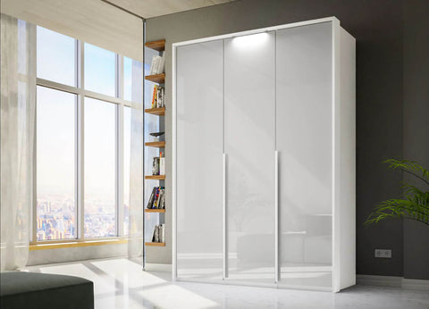 "Contemporary Frans Wardrobe with 3 Doors - White Glass finish. Elegant and functional design with elongated handles matching the cabinet color. Glass fronts provide a sophisticated touch. Available in three color options: Graphite, Silk Grey, and White. Elevate your storage with this stylish wardrobe." - 020