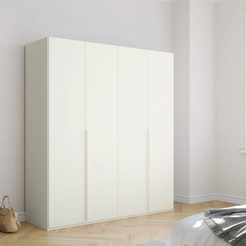 Rauch Frans Hinged Door Wardrobe with puristic design, revolving doors, spacious interior, premium quality, and soft-close mechanism. Customize your storage with 10-year warranty. Free assembly service included. - White Colour Lifestyle