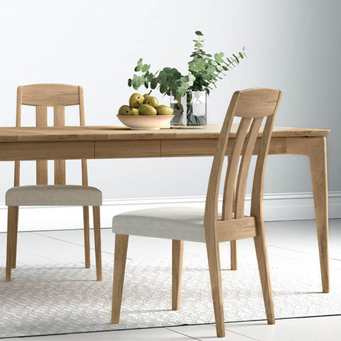 Solace Extending Dining Table showcasing contemporary design, solid wooden legs, and versatile extension mechanism. Explore at Pendle Village Furniture for stylish dining. Free delivery and convenient monthly payments. - 02