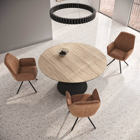 Black Pedestal Base Round Swivel Extending Dining Table with Swivel Tan Dining Chairs