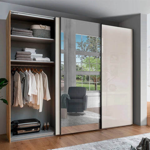 Wiemann Monroe Champagne Glass Sliding Triple Wardrobe with Mirror, Available in 4 width Sizes 225, 250, 280 and 300cm. Also 2 Height Sizes 217cm and 236cm. Premium Quality Wardrobe comes with 2 Years Warranty Depth is 67cm. We will deliver and Assemble for FREE - Open Door