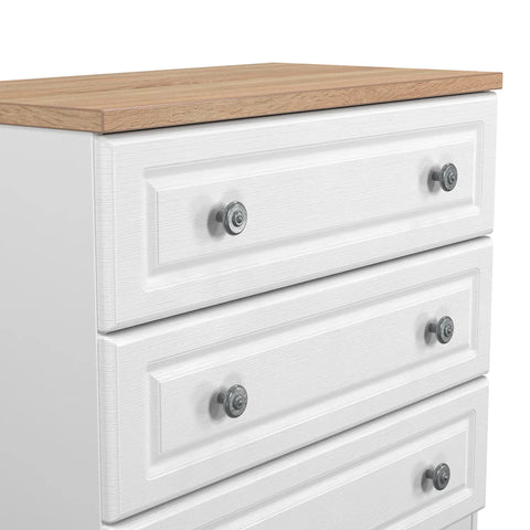 Norfolk 3 Drawer Chest, Norfolk is a two colour tone Bedroom Furniture which has Bardilon oak top and painted base. Available in choice of 3 colours White, Kashmir and Grey. Fully Assembled. Quick Delivery - Close up 