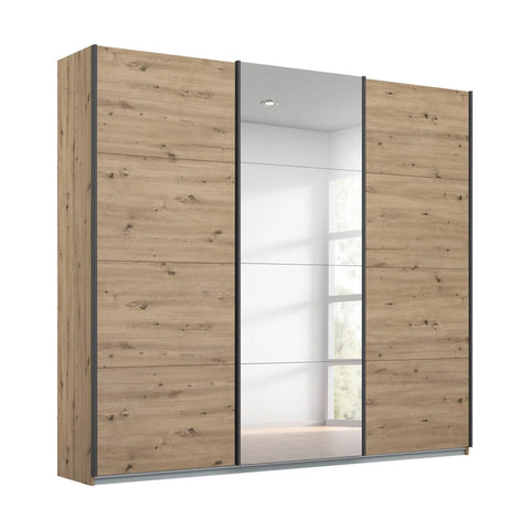 Pendle Village Furniture presents Rauch Forms 3 Door Sliding Wardrobe in Warm Oak with Metallic Grey Handles. Three internal compartments offer ample storage. Choose from two height options – 210cm or 229cm. Available in two width sizes: Small (203cm) and Large (271cm). Enjoy the convenience of Free Assembly - Middle Mirror Door