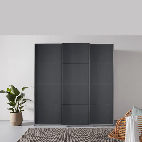 Rauch Forms Metallic Grey Sliding Wardrobe with customizable interior, elegant handles, and 10-year warranty. Free assembly and delivery by Pendle Village Furniture - Life style Image