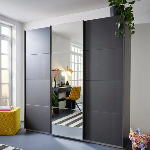 Rauch Formes Decor 3 Door Sliding Wardrobe With Middle Mirror Door Available in 2 Heights 210cm or 229cm and also have two width options 203cm and 271cm - Lifestyle Image Side view