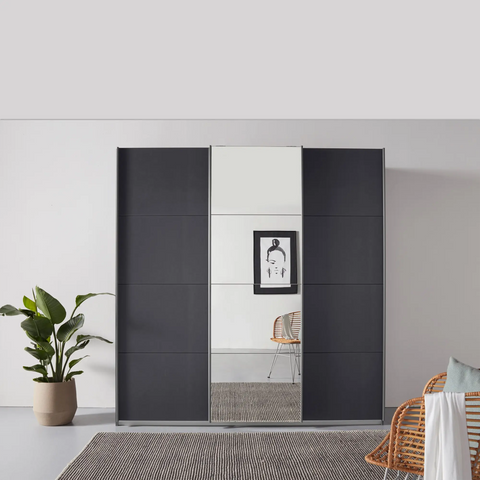 Rauch Formes Decor 3 Door Sliding Wardrobe With Middle Mirror Door Available in 2 Heights 210cm or 229cm and also have two width options 203cm and 271cm - Lifestyle Image