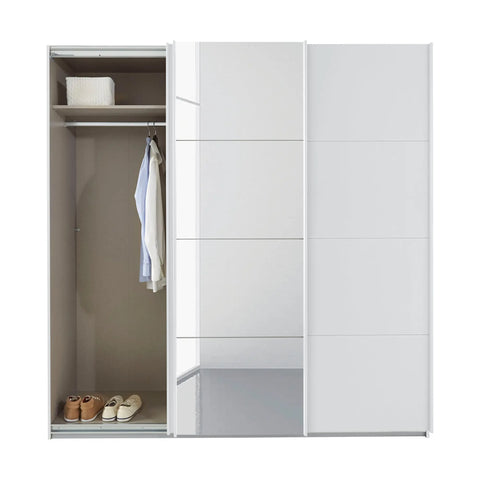 Rauch Forms 3 Door Sliding Wardrobe in Alpine White with Middle Mirror door and White Handles. Available in Small (203cm) and Large (271cm) widths, with options for 210cm or 229cm height. Designed for bedroom storage with customisable interior Pendle Village Furniture Wardrobes - Left Door Open to show inside wardrobe