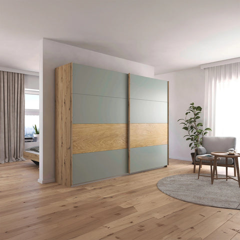 Rauch Malva 271cm Artisan Oak & Sage Green Sliding Door Wardrobe - Lifestyle 