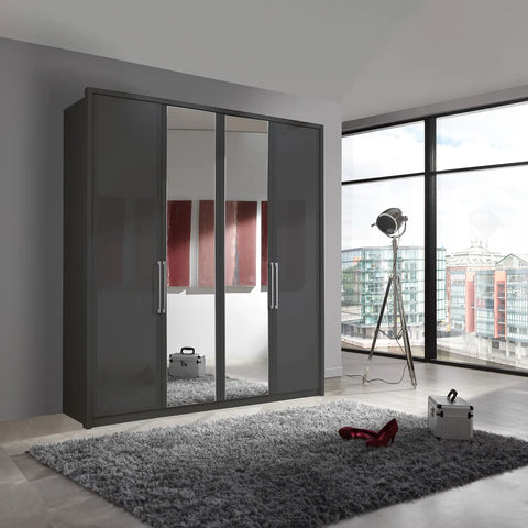 Image of Wiemann Bristol 4 Door Wardrobe with Graphite Carcase. Option of Matt or Glass finish on side doors, with middle doors featuring mirror pads. Dimensions: Width 200cm, Height 216cm, Depth 58cm. Free Delivery and Assembly. 12 months interest-free pay monthly available. - Lifestyle Image 