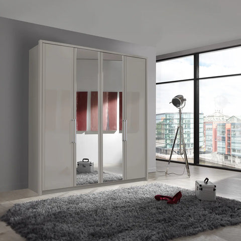 Image of Wiemann Bristol Pebble Grey 4 Door Wardrobe with Mirror. Option of Matt or Glass finish on side doors, with middle doors featuring mirror pads. Dimensions: Width 200cm, Height 216cm, Depth 58cm. Free Delivery and Assembly. 12 months interest-free pay monthly available. - Lifestyle Image