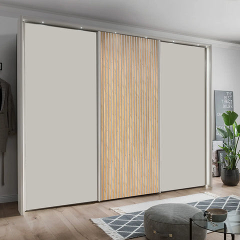 Wiemann Large 3 Door Sliding Door Wardrobe on Champagne and Oak Decking Door