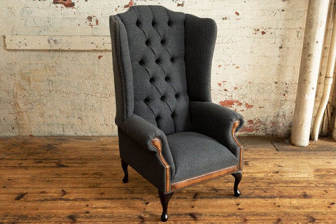 Oswald & Pablo Conrad Dark Grey Herringbone Wool Chesterfield Wing Chair, also available in other fabrics and colours - Angled Chair Image