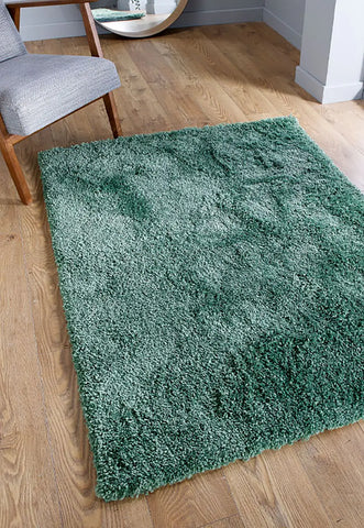 Serene Shaggy Soft Plain Rug, available in Charcoal, Cream, Grey, Gold, Beige, Pink, Red and Sage Green. Available in 5 sizes - Lifestyle Image - Sage Green